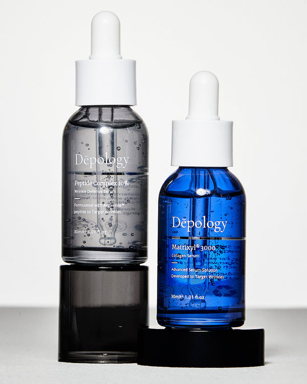 Two bottles of skin care serum with dropper caps, one labeled Peptide Serum and the other with a blue tint labeled Collagen Serum, set against a white background.